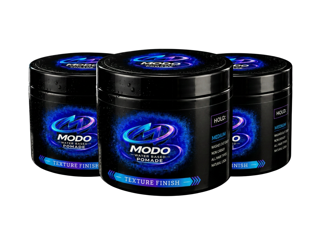 Three Modo pomade jars lined up on a black reflective surface
